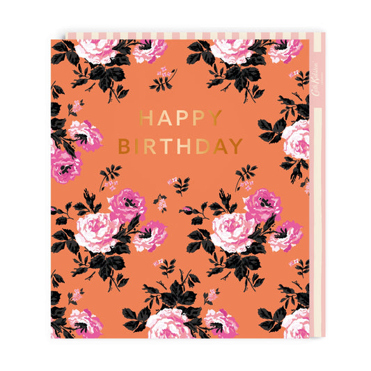 Orange Birthday card with pink flower illustrations. Gold Foil lettering that reads Happy Birthday
