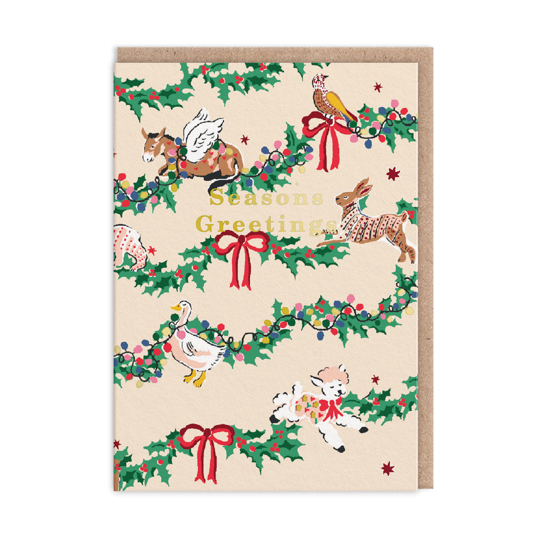 Cath Kidston Festive Animals Christmas Card - Animal illustrations surrounded by Holly. Gold Foil text reads Seasons Greetings