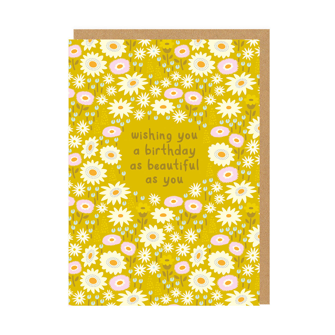 Yellow birthday card with a floral design and text reading Wishing You A Birthday As Beautiful As You
