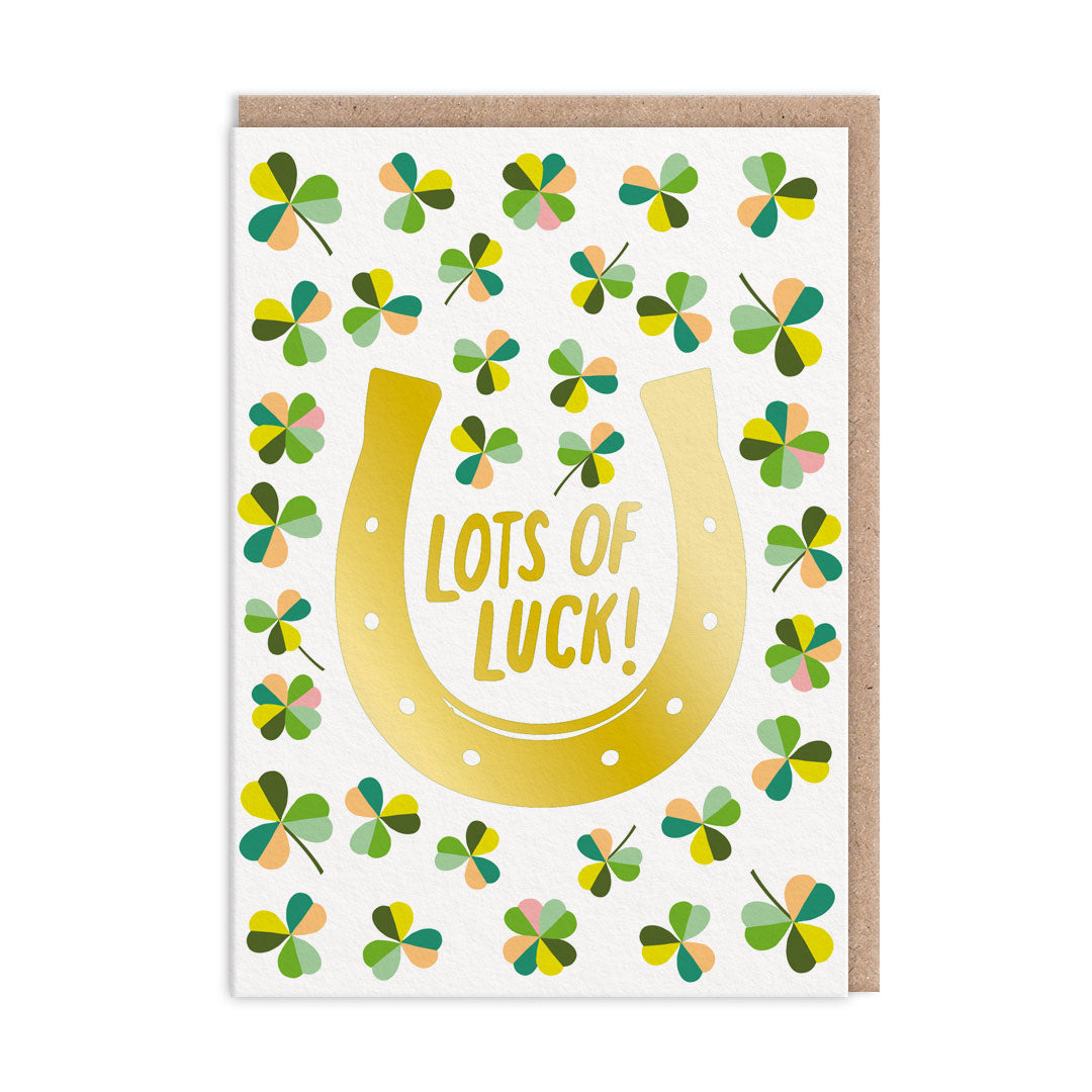 Good Luck Card featuring clover and horseshoe illustrations and text reads "Lots Of Luck". Text and horseshoe are finished with gold foil