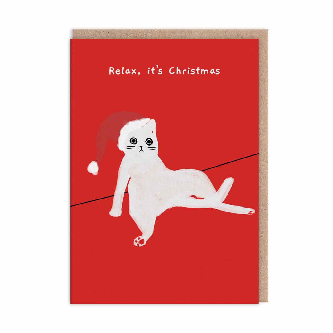 Relax It's Christmas Card. Red Card with an image of a cartoon cat in a santa hat stretched out. Text reads "Relax, It's Christmas"