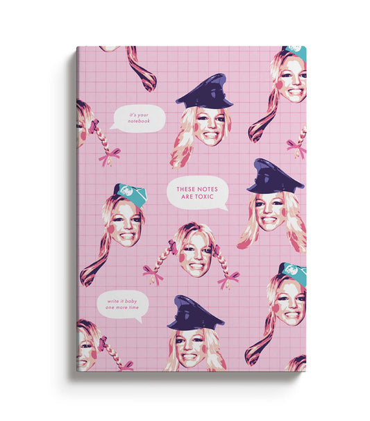 Pink notebook with Britney Spears images and text that reads These Notes Are Toxic