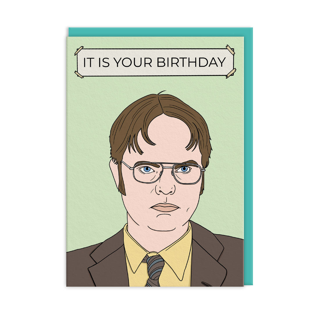 Birthday card with an illustration of Dwight Schrute from The Office US and a sign behind him that reads "It Is Your Birthday"