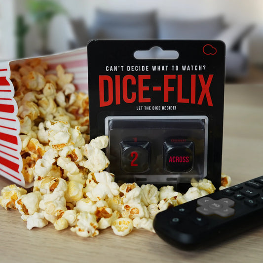 Dice-Flix packaging next to popcorn and tv remote